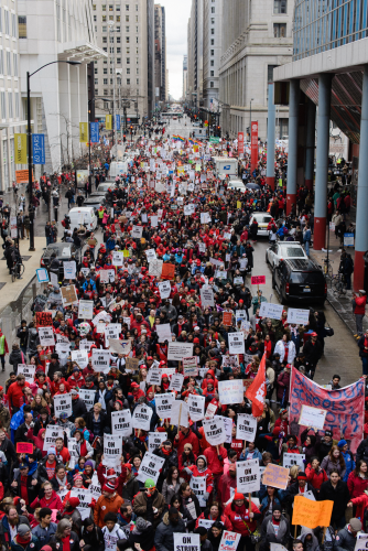 Thousands of protesters joined an hour-long march that traveled down Michigan Avenue and Lake Shore Drive, Luke White