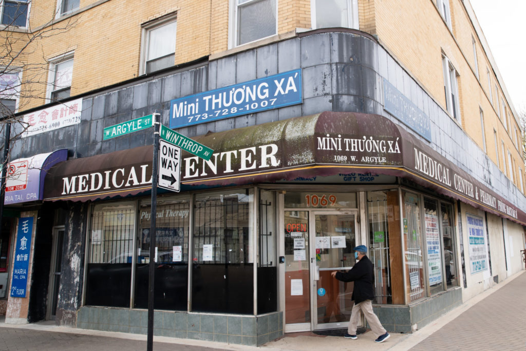 MiniTX Pharmacy is the oldest Vietnamese business on Argyle St.; many of the customers and patients speak limited English. (Linghua Qi/South Side Weekly)