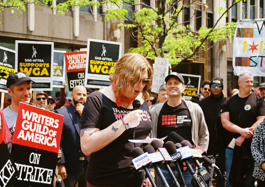 Lilly Wachowski, Chicago resident and filmmaker, speaks at the WGA protest outside the NBC Tower on May 17, 2023 in Chicago, Illinois. Photo Credits: Jocelyn Martínez-Rosales