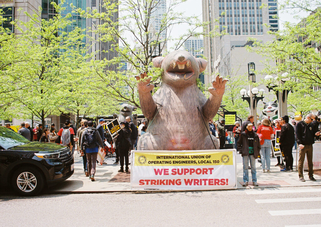Multilple unions showed up in solidarity to WGA including the infamous rats by the International Union of Operating Engingeers, Local 150 on May 17, 2023 in Chicago, Illinois. Photo Credits: Jocelyn Martínez-Rosales