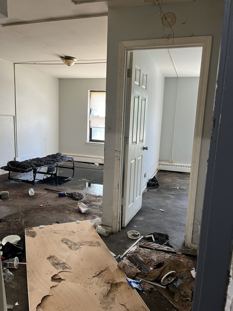 The inside of an apartment at 7500 S. South Shore Drive the day after the federal raid. Doors were broken, belongings scattered, and furniture overturned.